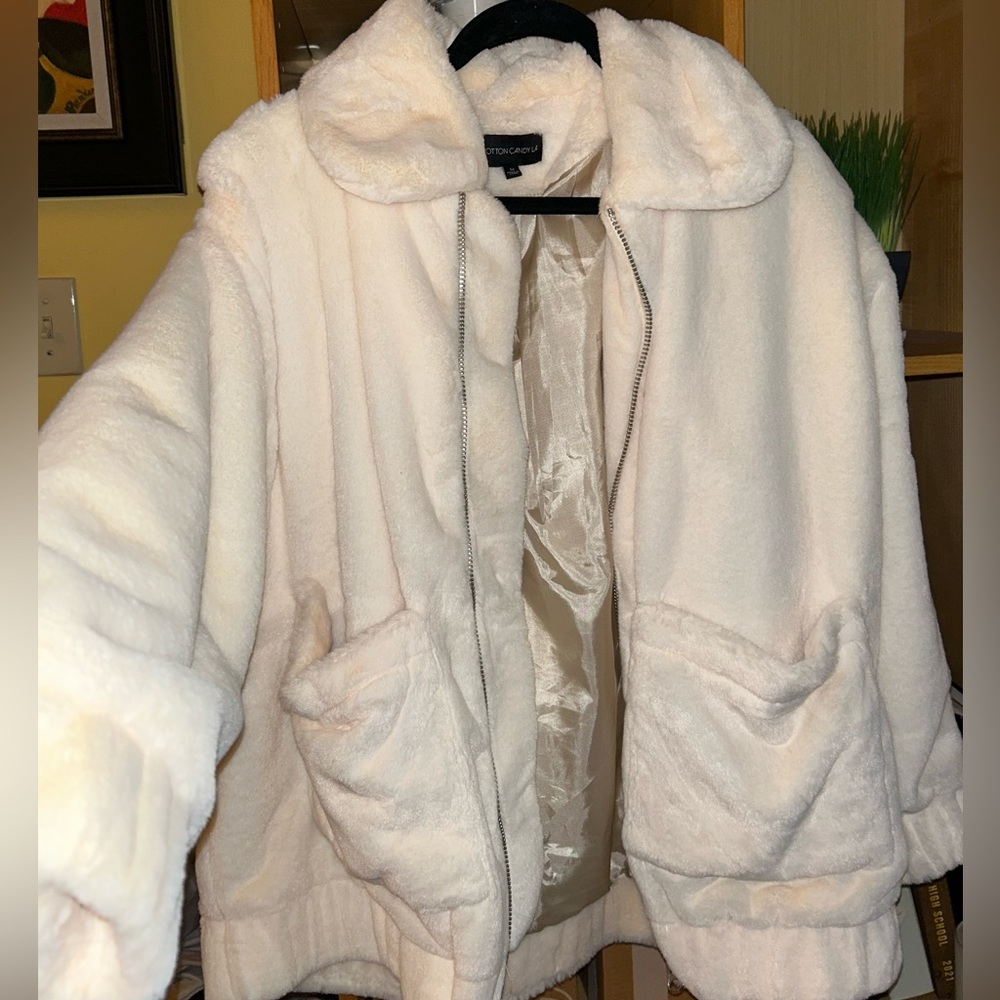 Silk-lined cream oversized faux fur jacket with collar